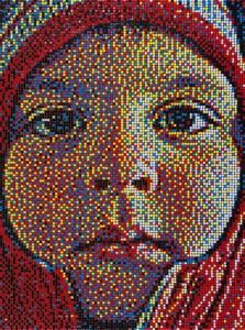 Detailed view of Eric Daigh’s thumbtack mosaic portrait of a young boy