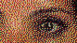 Close-up of a thumbtack mosaic artwork by Eric Daigh