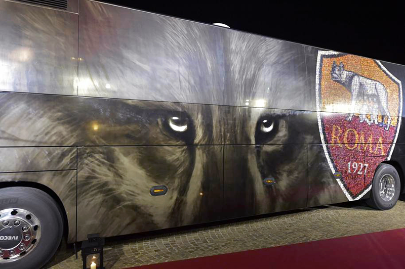AS Roma team bus wrapped with the #RideWithUs mosaic showcasing fan-submitted photos