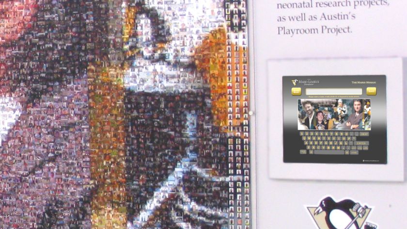 Interactive kiosk at the arena allowing visitors to search for their photos within the Mario Mosaic