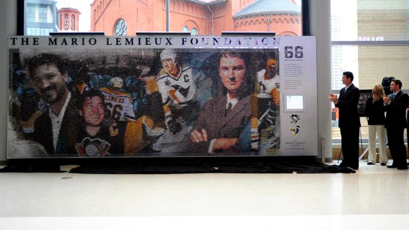 Full view of the 20ft x 8ft Mario Mosaic mural displayed at the Pittsburgh Penguins CONSOL Energy Center