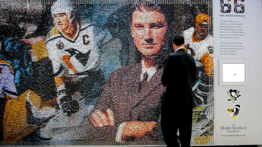 A closer look at the onsite installation of the Mario Online Interactive Photo Mosaic
