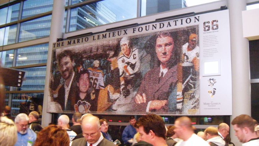 Full view of the 20ft x 8ft Mario Mosaic mural displayed at the Pittsburgh Penguins CONSOL Energy Center