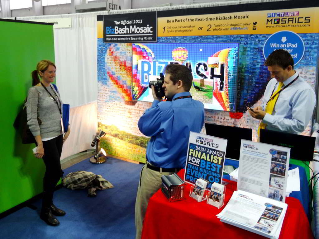 Onsite photographer capturing guest photos for the interactive mosaic at BizBash IdeaFest 2013