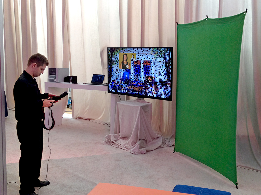 Event technician adjusting camera settings at the photo mosaic booth for the GettysburGreat Fundraiser
