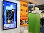 Digital mosaic featuring pop-out animations at Springer’s ALA Midwinter booth
