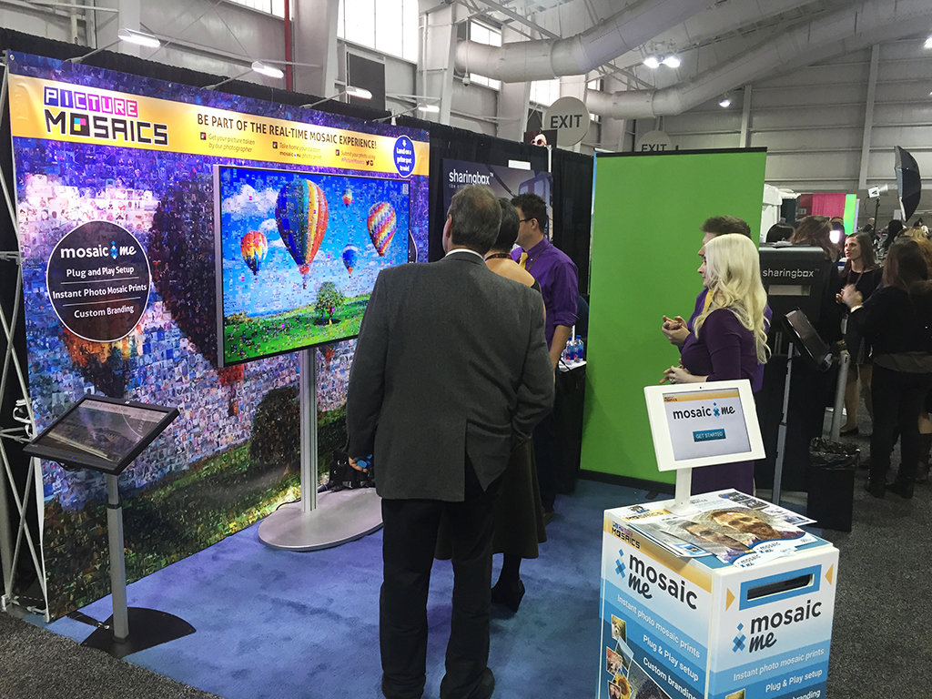 Picture Mosaics booth setup featuring photo mosaic wall, digital mosaic, and MosaicMe with guest interaction