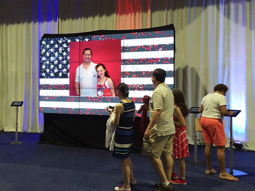 Guest admiring the Live Digital Mosaic at PoliticalFest 2016
