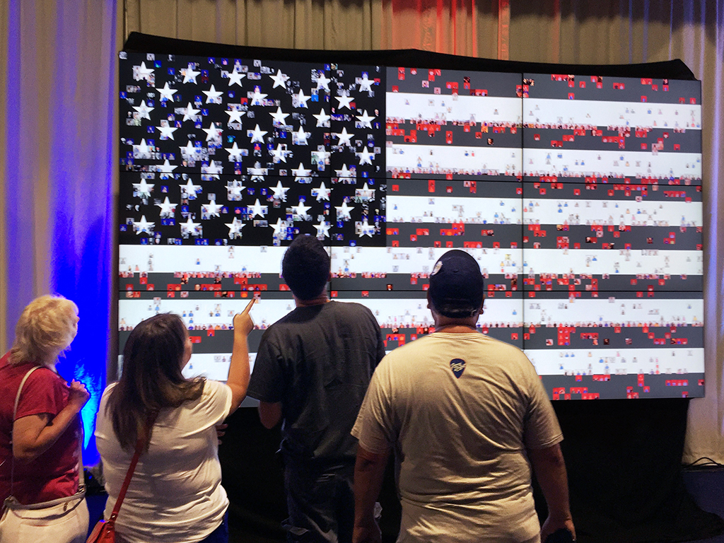 Guest interacting with the Live Digital Mosaic at PoliticalFest 2016