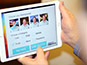Brand ambassador capturing guest portrait using tablet for the Live Mosaic at the Lidl Conference in Dublin