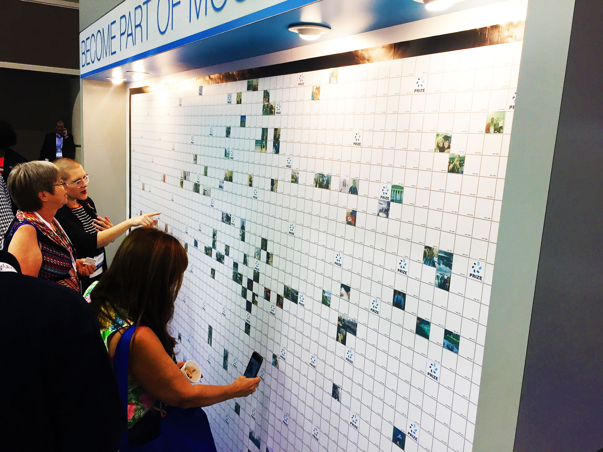 Guest having their portrait captured for the Live Print Mosaic at the ALA Annual Conference