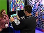 Event tech capturing a guest’s photo using the iPad kiosk station