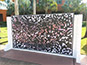 Partially complete photo mosaic on lego block structure