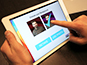 Guest interacting with an iPad to choose their preferred selfie background