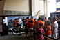 Guests at the Texas Longhorn Orange-White Spring Game Live Print Mosaic Event, preparing to participate