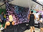 Partial filling of the photo mosaic at Mercedes’ Pride Toronto booth