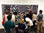 Progress view of the mosaic being built throughout the Tarkett Neocon event