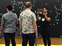 Photographer capturing moments at the Google booth during the live print mosaic event at ISTE