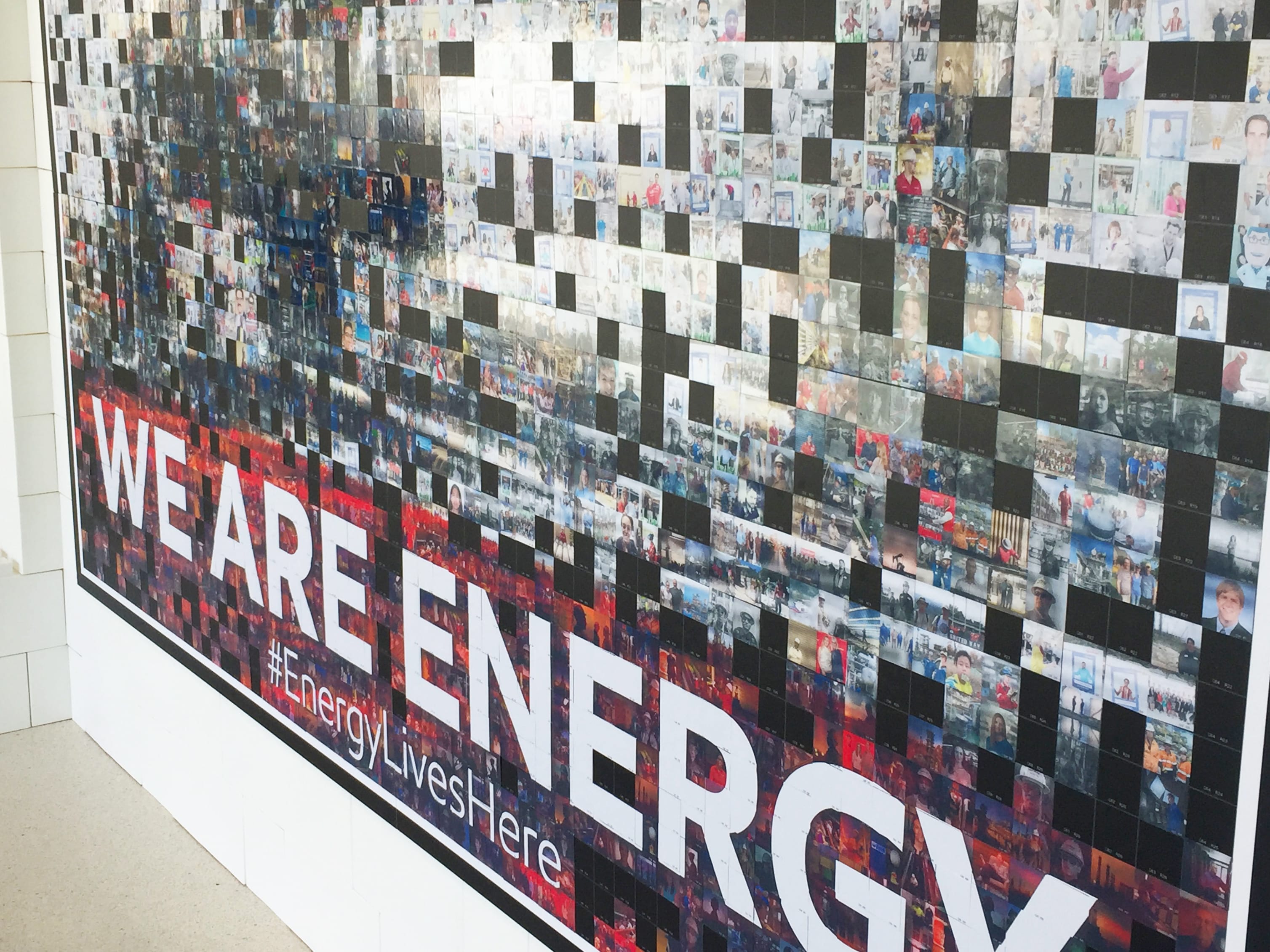 Progression image of the We Are Energy mosaic wall as it fills in