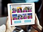 Guest selecting photo background at the iPad kiosk station