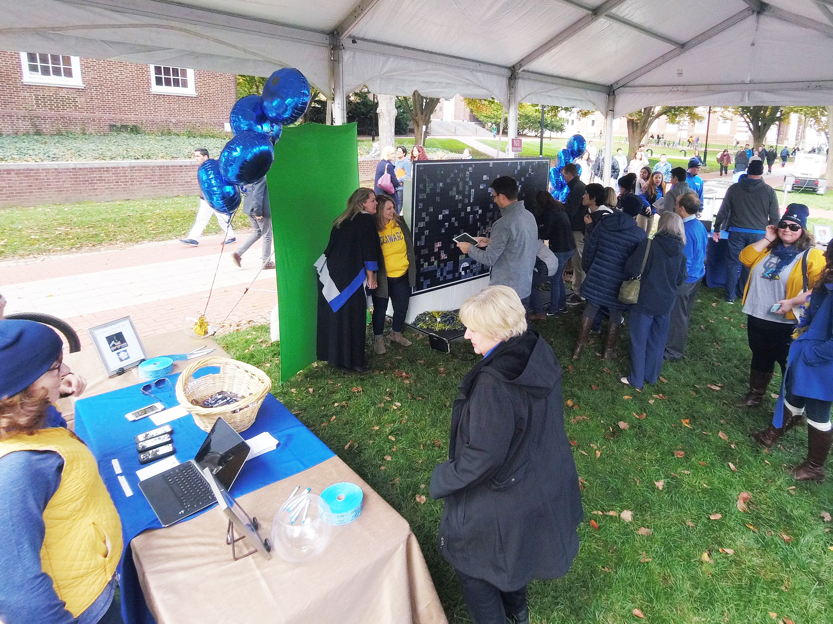 Live print mosaic activation setup with printer and submission kiosk