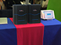 Live photo mosaic setup featuring instant printers and iPad kiosks