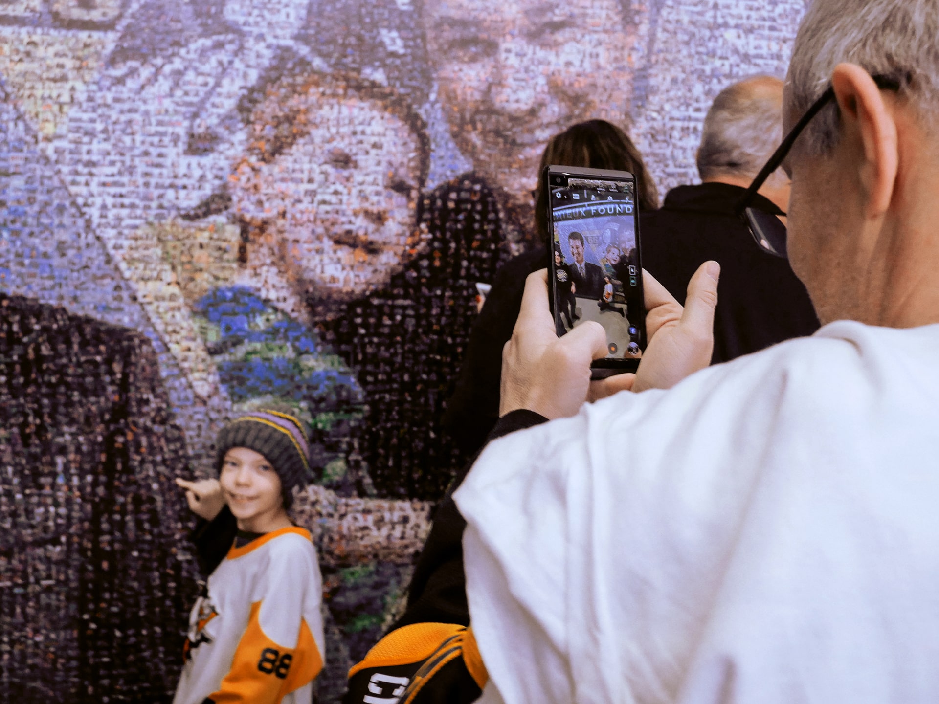 User searches for their photo within the Mario Mosaic 2.0 wall.