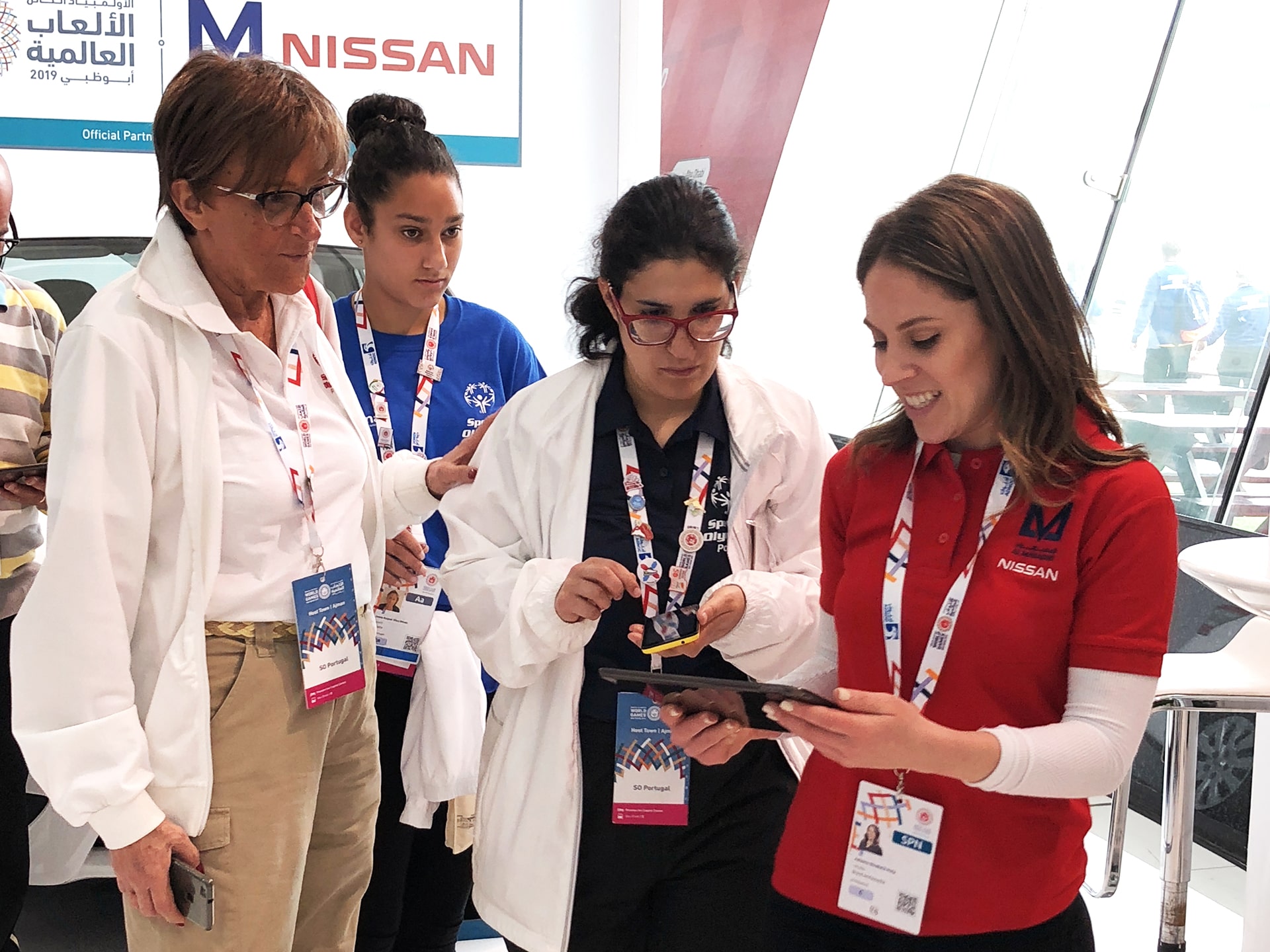 A guest fills out a digital form before receiving their printed mosaic tile at the 2019 Special Olympics World Games.