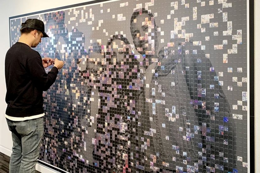 Backstreet Boys: The Experience – Guest placing mosaic photo onto the wall.