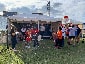 Fans waiting in line to participate in the Live Print Mosaic experience at Super Bowl LV.