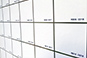 Close-up of photo mosaic tiles showing coordinate markers for placement