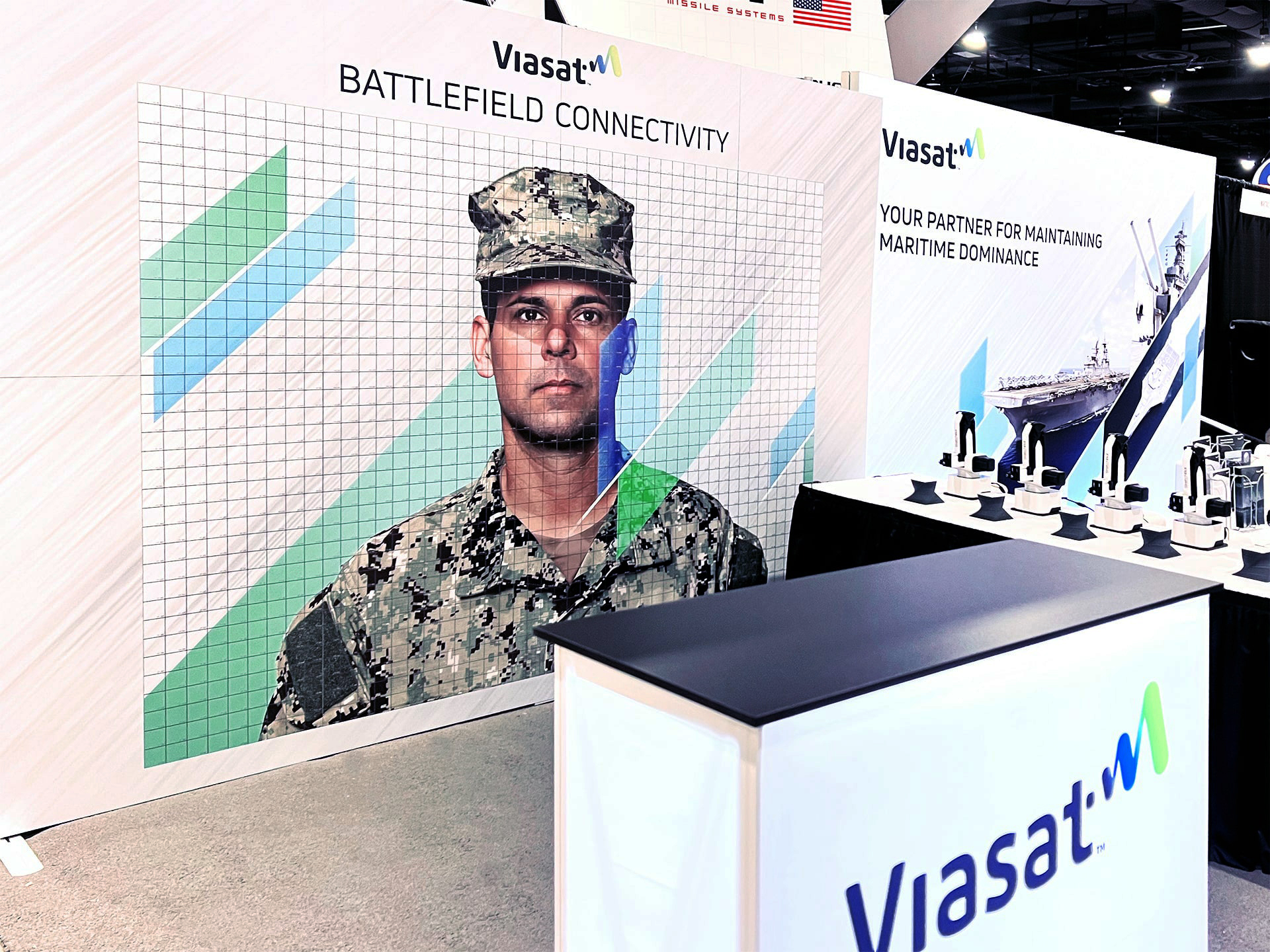 The early stages of a SketchBot mosaic being created at the Viasat booth.