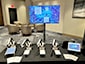 SketchBot portraits and digital mosaic setup for CEMA Summit activation