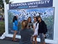 Group posing at the iPad photo booth.