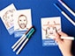 Close-up of a guest coloring in their sketch