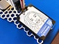 A close up of a sketch of a woman's portrait being completed on the SketchBot