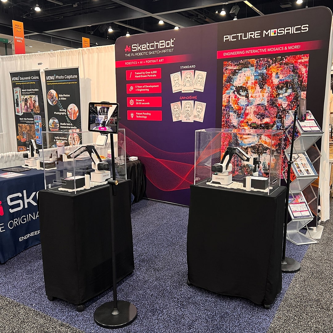 SketchBots kiosk models on display at AAM 2025 Expo booth with full event setup
