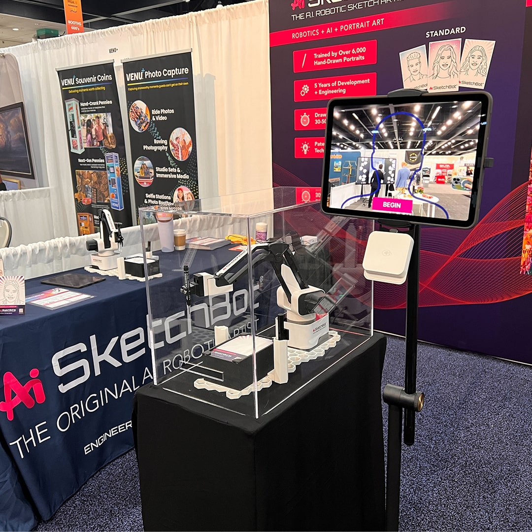 Full SketchBot Pro setup including kiosk, drawing bot hardware, and interactive display