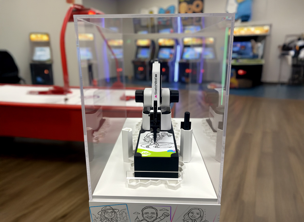 Ai SketchBot Pro kiosk in FatCats Family Fun Center