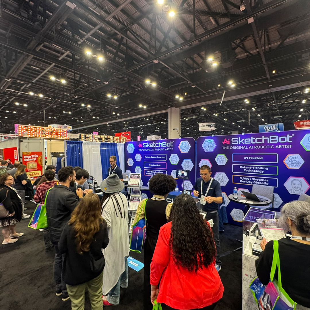 People lining up to get their very own sketch and to learn all about what SketchBot has to offer