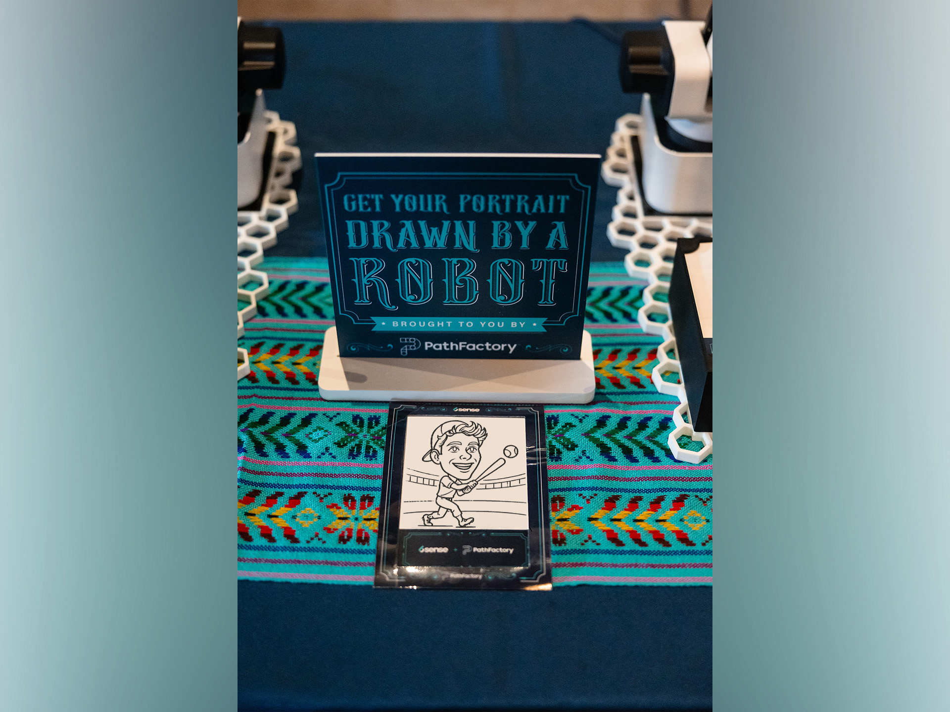 SketchBot portrait housed inside a custom branded frame