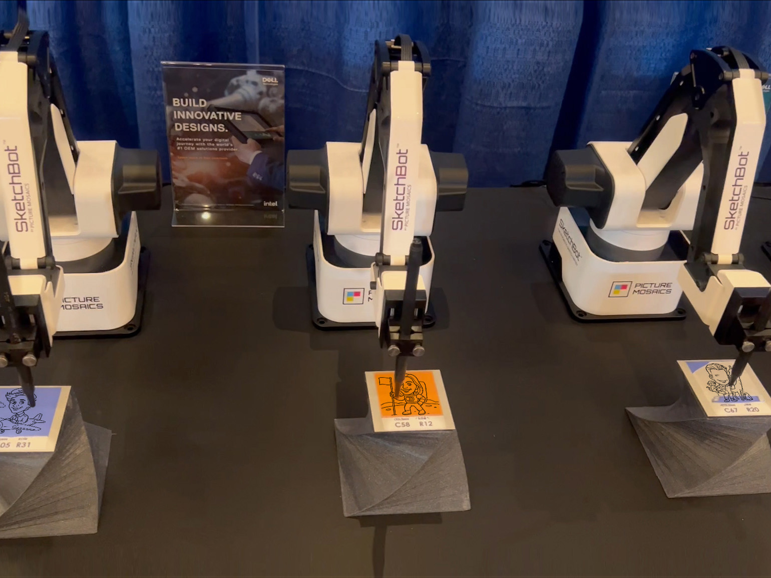 Fleet of SketchBots drawing individual portraits for mosaic wall installation