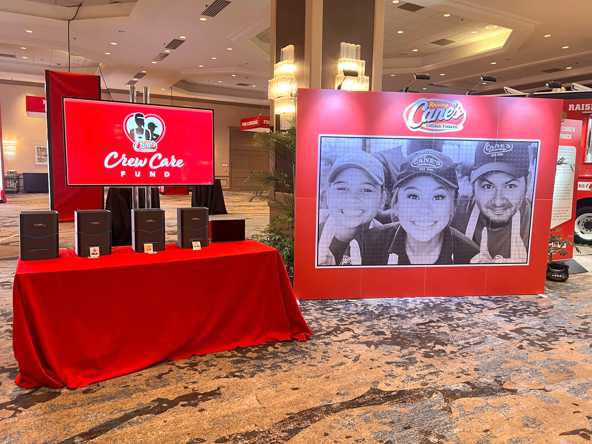 Raising Cane's photo mosaic wall set up