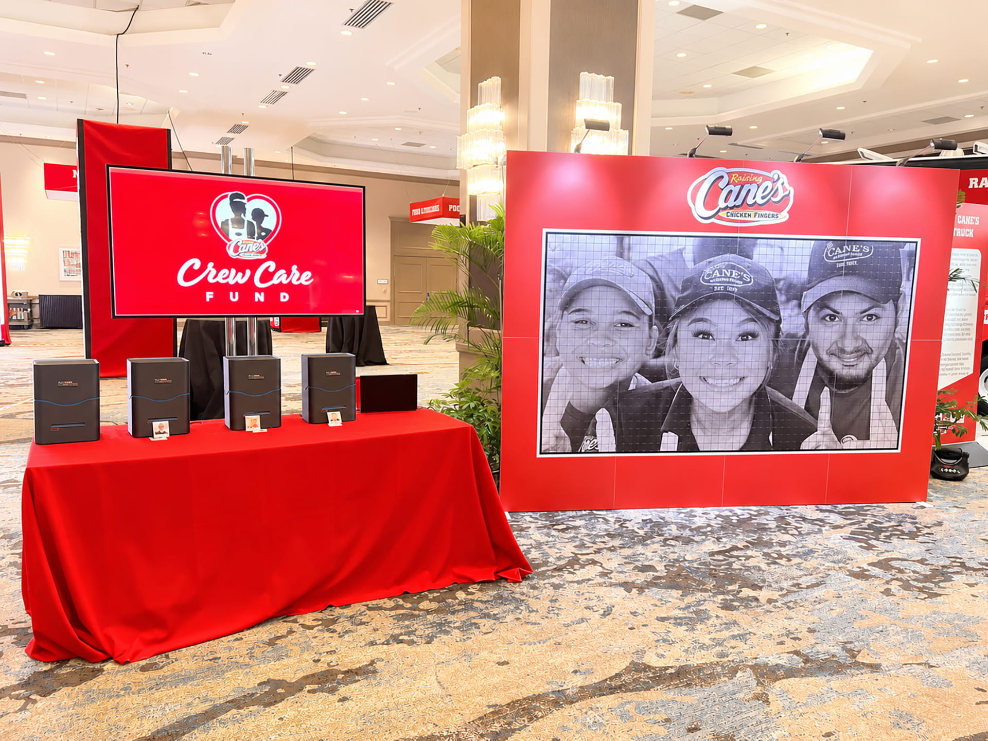 Raising Cane's photo mosaic wall set up
