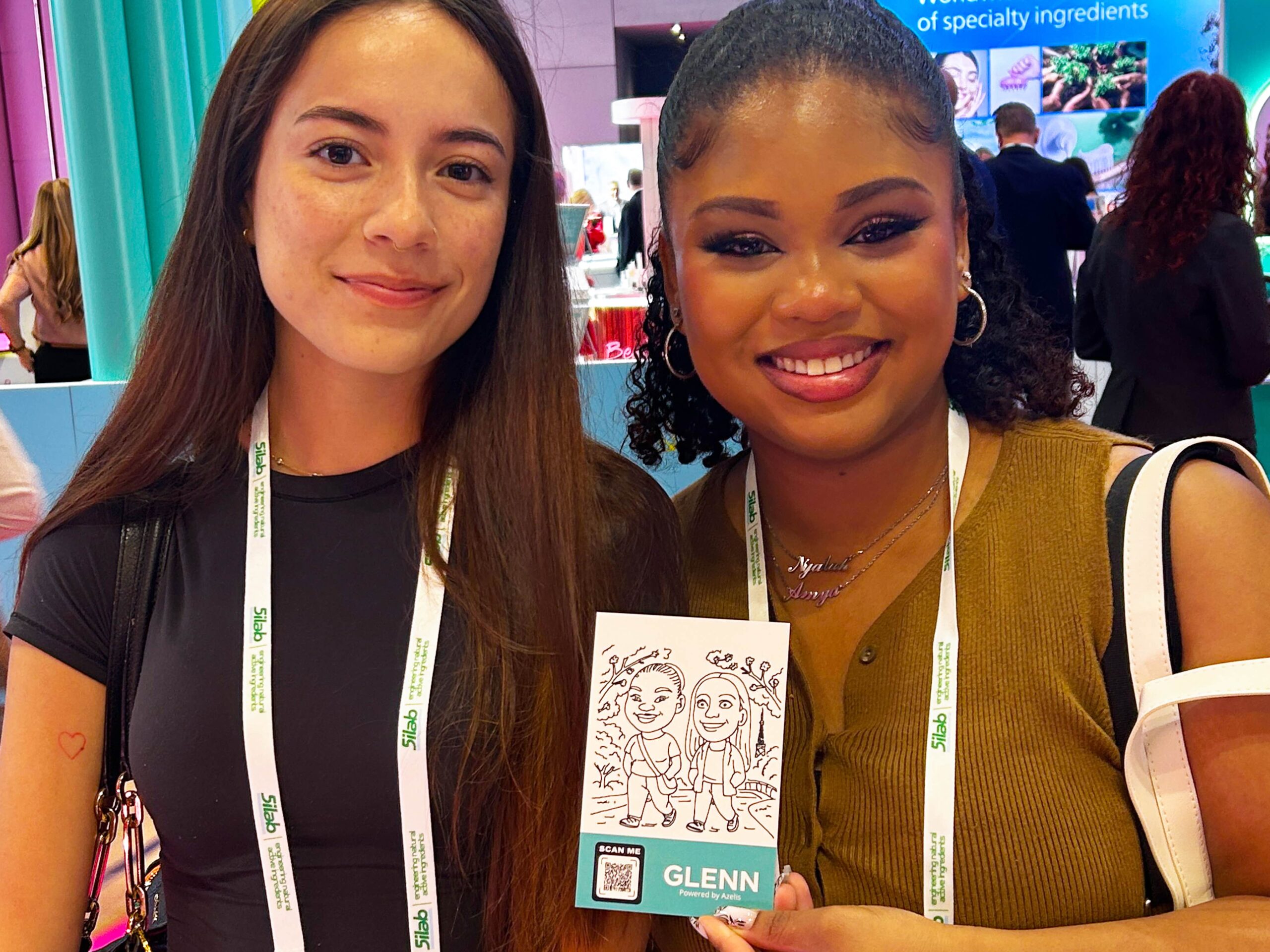 Two women showing of their robotic drawn sketch of them shopping
