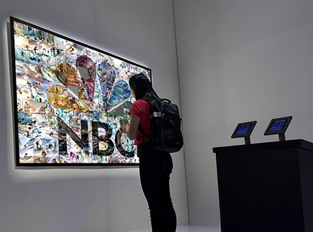 NBC themed Ai mosaic wall created digitally using guests' passions and hobbies