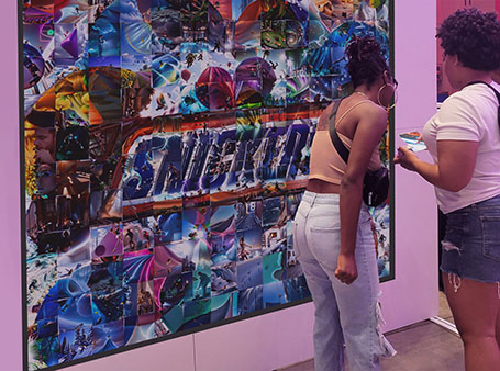 Snickers print Ai photo mosaic with guests placing their own tiles