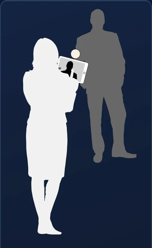 A brand ambassador photographing a guest with a tablet.