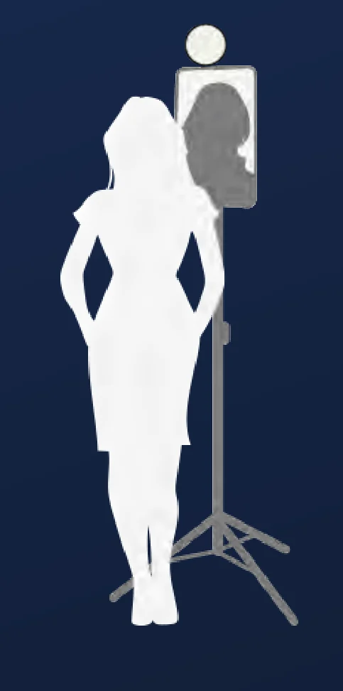 A guest posing at a self-standing ring light photo booth.