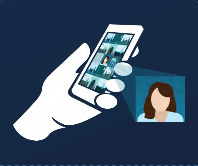 A hand holding a phone showing the digital version of a guest photo.
